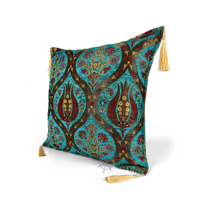 Turquoise pillow cover – angled front view, Royal Garden woven decorative cushion cover highlighting the ornamental motif, textured fabric, and elegant corner tassels (45 × 45 cm / 18 × 18 in)